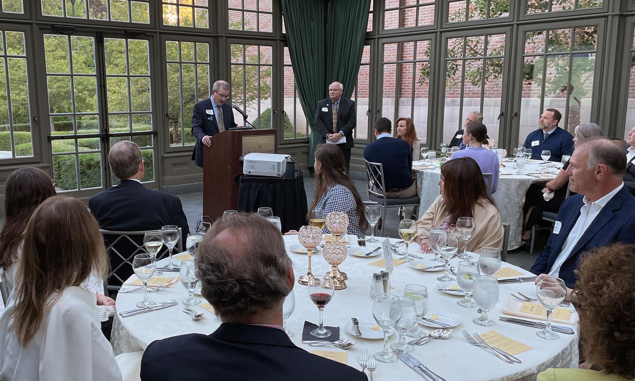 An image of a speaker at the Auschwitz dinner event